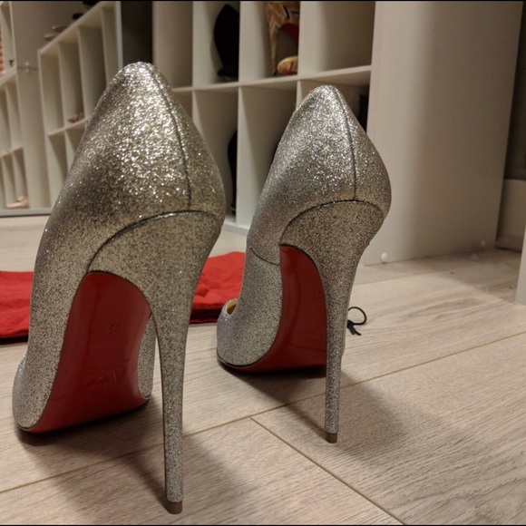 Christian Louboutin Shoes - Minor scratch on the side and a little rip on the side as well. Good condition